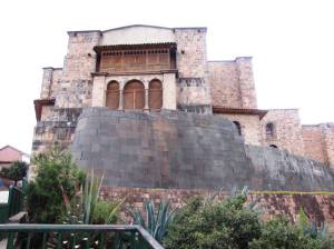 This is Qurikancha. I'm assuming the Spanish said: "Hey look at this really awesome building! Let's build a church on it"